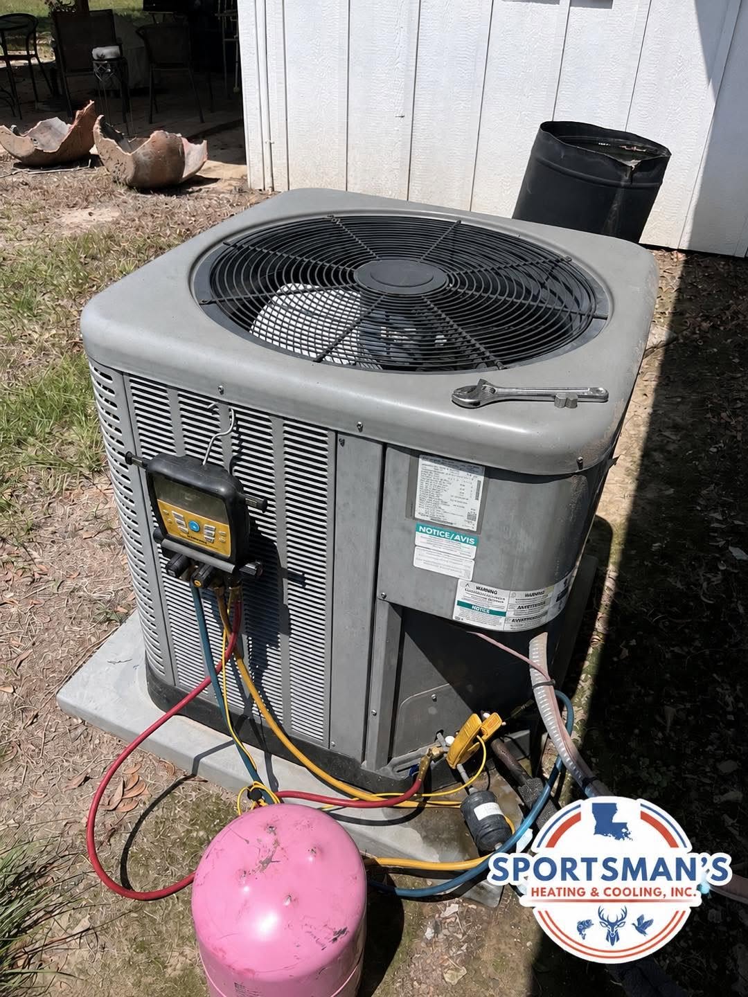 Outdoor condenser with service gauges attached